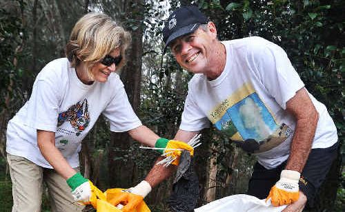 Anita Lee and Peter Coyle do their bit during Clean Up Australia Day in Coffs Harbour. Anita Lee and Peter Coyle do their bit during Clean Up Australia Day in Coffs Harbour.